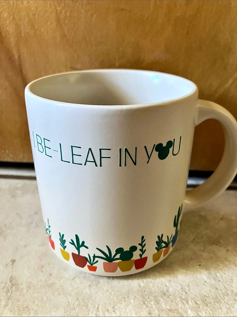 Disney Mickey Mouse Icon 'I Be-Leaf In You' Plants Mug White & Green NWOT